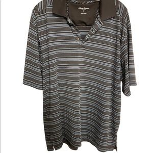 Tommy Armour Golf polo. Fits like an XL. Dri-logic material.